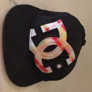 DC black with multi colored design